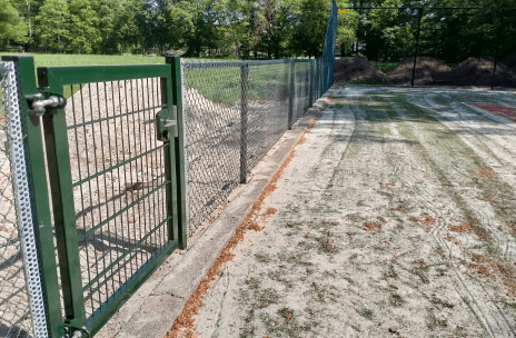 Hekwerk tennisbaan